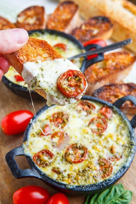 This dip is quite literally a caprese salad with tomatoes, mozzarella and basil pesto that is baked until the cheese is all melted and ooey and gooey and oh so good! Caprese Dip, Melted Cheese Dip, Cheese Recipes Appetizers, Cheese Appetizers, Health Conscious, Appetizer Dips, Dip Recipes, Yummy Appetizers, Appetizer Snacks