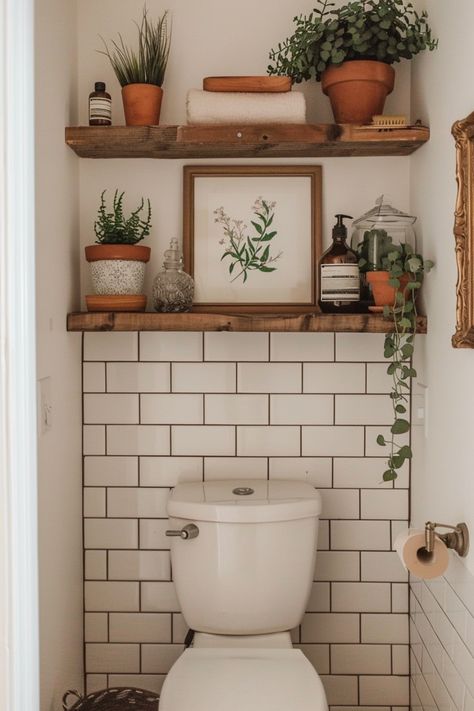 Get extra storage in your bathroom with these tips to help you choose new floating shelves. Toilet Inspo Bathroom Ideas, Bathroom Shelf Idea, Above Toilet Decor Ideas, Bathroom Nook Ideas, Shelving In Bathroom, Floating Shelves In Bathroom, Floating Shelves Above Toilet, Bathroom Shelves Decor, Floating Shelves Over Toilet