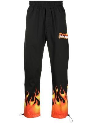 Designer Trousers for Men - Farfetch Art On Pants, Outfit Ideas Sweatpants, Camoflauge Pants, Flame Pants, Creative Outfit Ideas, Designer Sweatpants, Jeans Design, Sweatpants For Men, Conceptual Fashion