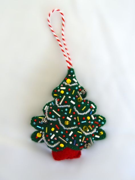 Each ornament is lovingly designed with vibrant colors and detailed embellishments, making them a timeless addition to your holiday traditions. These ornaments are perfect for gifting or for adding a whimsical, handmade touch to your own seasonal décor.

**Product Details:**
- Handmade with felt and bead accents
- Set includes 5 unique designs
- Roughly 4 inches tall
- Ready to hang with attached loops Weird Christmas, Felt Ornaments Diy, Diy Felt Christmas Ornaments, Initials Ornament, Felt Crafts Christmas, Felt Beads, Felt Christmas Decorations, Felt Christmas Tree, Christmas Wood Crafts