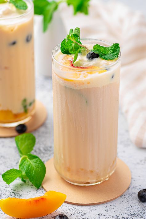 Creamy Peach Tea Peach Tea Recipe, Passion Fruit Margarita, Lemon Cheesecake Bars, Peach Drinks, Homemade Strawberry Sauce, Peach Ice Cream, Fruit Pops, Strawberry Banana Smoothie, Strawberry Sauce