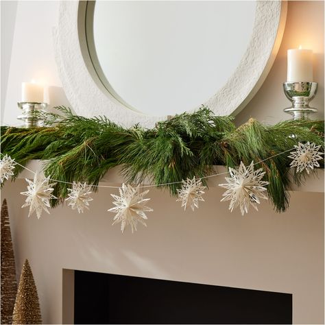 Paper Snowflake Garland | West Elm Paper Snowflake Garland, Holiday Mantle Decor, Snowflake Garland, Paper Snowflake, Modern Christmas Decor, Christmas Ornament Wreath, Seasonal Displays, Diy Fall Wreath, Snowflake Decorations