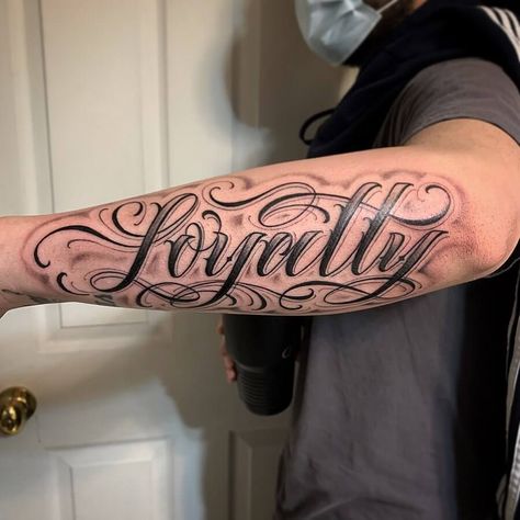 Loyalty Tattoo Shading Around Letters Tattoo, Loyalty Script Tattoo, Old English Forearm Tattoo, Loyalty And Respect Tattoos, Right Shoulder Tattoo Men, Loyalty Tattoo For Men, Blessed Arm Tattoo, Loyalty Tattoo For Women Ideas, Loyalty Tattoo Stencil