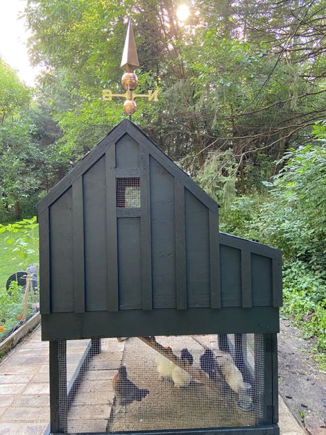 Copper finial, chicken coop, scandinavian black Corrugated Metal Chicken Coop, Chicken Coop Ideas Black, Minimalist Chicken Coop, Scandinavian Chicken Coop, Dark Green Chicken Coop, Black Chicken Coop Ideas, Gothic Chicken Coop, Tall Chicken Coop, City Chicken Coop