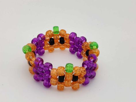 Halloween Jack-o-lantern Kandi Bracelet Halloween Kandi Cuff, Halloween Bead Bracelet, Kandi Pumpkin, Halloween Kandi Ideas, Halloween Kandi Bracelets, Kandi Halloween, Kandi Bracelets Patterns, Kandi Bracelets Ideas, Kandi Core