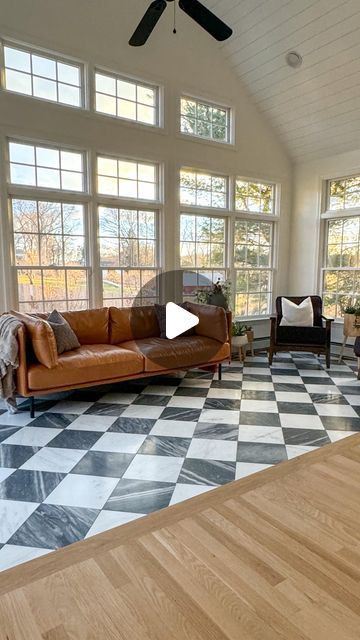 Ally • Sharing inspo to renovate & redecorate on Instagram: "Checkmate! ♟️ 🩶🤍♟️. Have you ever thought about checkerboard tile in your home?  This gray and white checkerboard makes such a statement in our sunroom and what a difference it makes compared to the dingy tile we used to have.  We also painted the walls in here, added a shiplap ceiling and added a new caramel leather sofa from @crateandbarrel that is unbelievably comfortable and so stylish.   ♟️Comment TILE for details and links!   ♟️Tile: Honed marble checkerboard 🩶🤍Bardiglio Gray & Casablanca Carrara ♟️@riadtile   #checkerboardfloor  #statementtile  #sunroom  #sunroominspo  #transitionaldesign  #transitionalmodern  #transitionalstyle  #howihome  #howihaven  #myhomevibes" Caramel Leather Sofa, Checkerboard Tile, Statement Tiles, Shiplap Ceiling, Checkerboard Floor, Honed Marble, Transitional Modern, Kitchen Inspo, Transitional Design