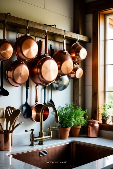 Elevate your kitchen aesthetic with the timeless charm of a copper kitchen. From cookware to accents, incorporating hints of copper can instantly add warmth and elegance to your space. Imagine the gleam of copper pots hanging above an island, complemented by matching utensils and small appliances. The richness of this metal beautifully contrasts with light or dark cabinetry, making every culinary creation a visually stunning experience. Over Island Pot Rack, Copper Utensil Holder, Copper Pans Hanging In Kitchen, Wall Mount Pot Rack, Hanging Copper Pots In Kitchen, Copper Pots And Pans Display, Pot Hangers For Kitchen, Upstate Farmhouse, Copper Interior Design