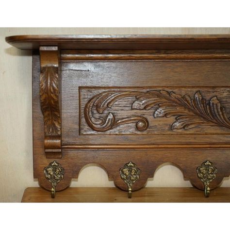 Heavily carved Dutch oak wall hanging coat hat and scarf rack with French Romantic couples head gold gilt brass hooks. A very good looking well made and decorative coat wall rack, I have seen these used in hallways, bathrooms, studys, attached to the sides of furniture and even in kitchens to hang utensils from, it is a very well made utilitarian piece. The condition is excellent, we have cleaned waxed and polished the timber from top to bottom, the gilt brass hooks have nicely aged and have a w Antique Coat Rack, Coat Wall, Scarf Rack, Vintage Coat Rack, Oak Wall, Brass Hooks, Hook Rack, Wall Rack, Brass Hook