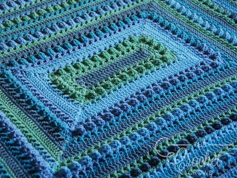 Crochet Hugs + Kisses Around the Block | The Crochet Crowd Crochet Blanket From The Middle, Crochet Rectangle Blanket Pattern, Crochet Rectangle Blanket In The Round, Crochet From The Middle Blanket, Crochet Blanket Border, Crochet Square Blanket, Crochet Crowd, Crochet Afgans, Crochet Afghan Patterns Free