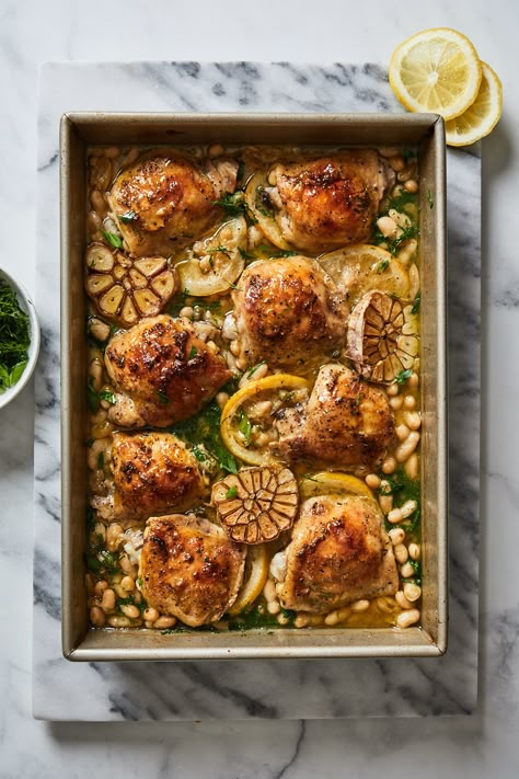 Roasted Chicken With White Beans and 20 Cloves of Garlic | Olive  Mango Chicken With White Beans, Lemon And Garlic Chicken, Spring Dishes, Classic French Dishes, French Dishes, Mango Recipes, Classic Dishes, Food Magazine, White Beans