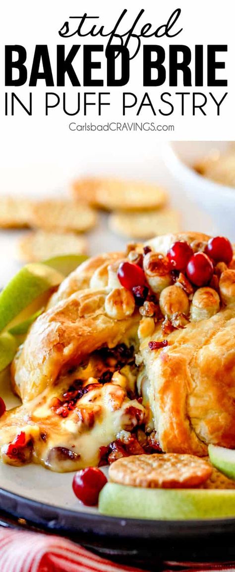 baked brie in puff pastry with with jam and cranberries oozing out of center Baked Brie Puff Pastry, Baked Brie In Puff Pastry, Brie In Puff Pastry, Party Nibbles, Baked Brie Recipes, Brie Puff Pastry, Brie Appetizer, Puff Pastries, Brie Recipes