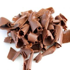 How to Make Chocolate Curls - Spend With Pennies Happy Chocolate Day, Honey Chocolate, Chocolate Garnishes, Spend With Pennies, Chocolate Curls, Chocolate Day, Chocolate Butter, Icebox Cake, Chocolate Decorations