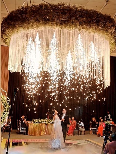 Rustic Wedding decorations on a budget that looks so elegant - Hike n Dip First Dance On Cloud, Wedding First Dance Special Effects, Wedding Special Effects, Cold Pyros Wedding Entry, Wedding Pyrotechnics, Indian Reception Ideas, Pyrotechnics Wedding, Indian Reception Decor, Indian Wedding Reception Decor