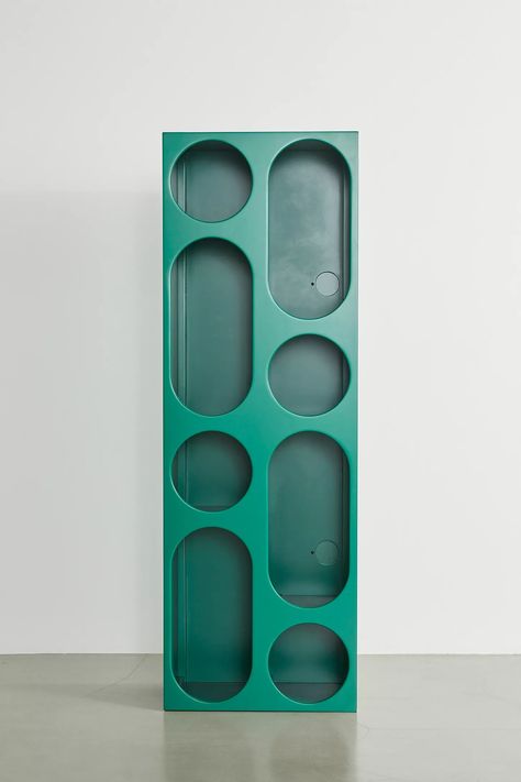 Create an artful display out of your collection of novels, trinkets, plants and more with this storage console. Features eight cubbies in alternating circular and ovular shapes with a duo of cutouts in the back panel to hide your cords. Its rectangular frame is so versatile, allowing you to display your console vertically or horizontally in your space. Available exclusively at Urban Outfitters. *Contains affiliate link that may earn commission at no additional cost to you. Geometric Furniture Design, Geometric Furniture, Beautiful Home Gardens, Bat Cave, Storage Console, Modern Bookshelf, 70s Decor, Decorative Cabinet, Simple Living Room