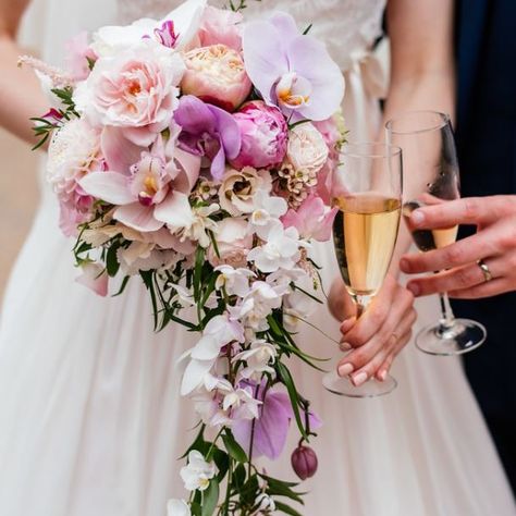 A Delicate cascade bouquet of Orchids, Garden Roses, Peonies and Dahila by Florae Foray, Image courtesy of Aaron Collett Photography Orchids And Peonies, Orchid And Peonies Wedding Bouquet, Orchid And Peony Bouquet, Orchid Rose Bouquet Wedding, Bouquet Of Orchids, Peony Rose Orchid Bouquet, Garden Rose Bouquet, Orchid Bouquet, Roses Peonies