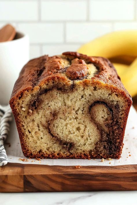 This Easy Cinnamon Swirl Banana Bread is perfectly moist with rich banana flavor and ribbons of cinnamon sugar swirled throughout for the ultimate treat! Banana Bread With Cinnamon Swirl, Banana Bread Swirl, Caramelized Banana Bread, Banana Bread Recipe With Cinnamon, Cinnamon Swirl Banana Bread Recipe, Banana Swirl Bread, Banana Bread Cinnamon Swirl, Banana Bread Recipe Cinnamon Swirl, Banana Cinnamon Swirl Bread