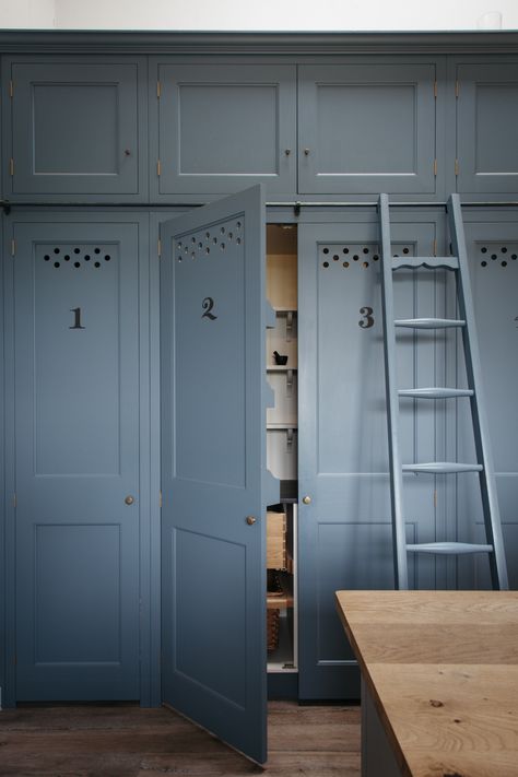 Numbered kitchen cabinets with ventilation holes and a rolling ladder in a Dorset farmhouse kitchen by Plain English English Farmhouse Kitchen, Plain English Kitchen, Beautiful Pantry, English Farmhouse, Bespoke Kitchen Design, Plain English, Pantry Cupboard, Traditional Kitchen Design, Sandberg Wallpaper