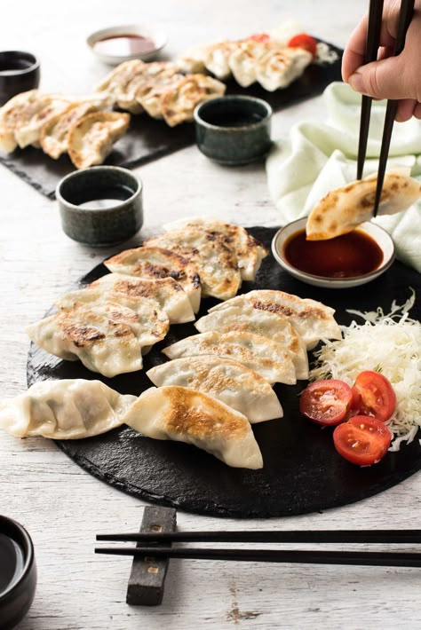 Gyoza (Japanese Dumplings) - A traditional Japanese recipe! Plus a VIDEO to learn how to wrap them! Gyoza Wrappers, Japanese Gyoza, Gyoza Dumplings, Japanese Dumplings, Japanese Recipe, Mapo Tofu, Recipetin Eats, How To Wrap, Japanese Cooking