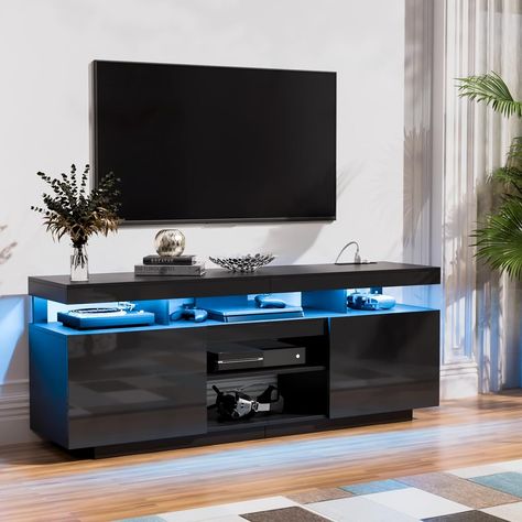 Modern & Power Outlets】TV stand is equipped with 4 standard plug outlets and a 6.5ft power cord, allowing you to conveniently charge your phone, WiFi router, iPad, and more. 【Spacious Storage Space】Offers 5 open shelves and 2 large cabinets. Store DVDs, CDs, gaming devices, books, etc. The removable middle shelf allows customization, perfect for your PS5 and gaming gear. The back wire holes also help you organize wires and cables to ensure a neat and clean line of sight. Large Cabinets, Gaming Tv, Tv Consoles, Tv Entertainment Centers, Black Tv Stand, Led Tv Stand, Modern Entertainment Center, Black Tv, Large Cabinet