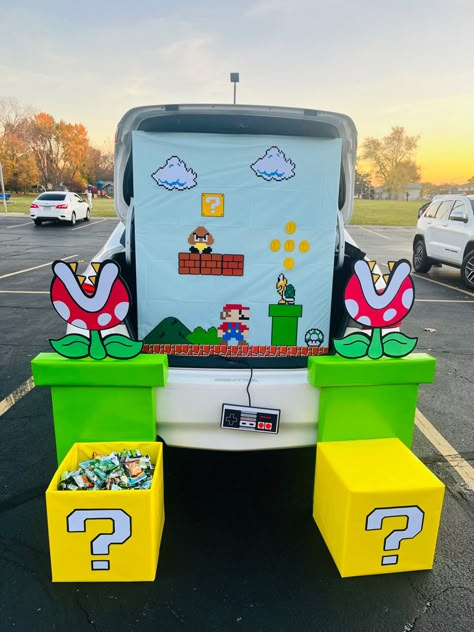 Super Mario Bros Trunk Or Treat Diy, Game Theme Parade Float, Super Mario Trunk Or Treat Game, Mario World Trunk Or Treat, Trunk Or Treat 2023 Ideas, Spooky Mario Trunk Or Treat, Mario Kart Trunk Or Treat Ideas For Cars, Trunk Or Treat Video Game Theme, Mario Halloween Trunk Or Treat