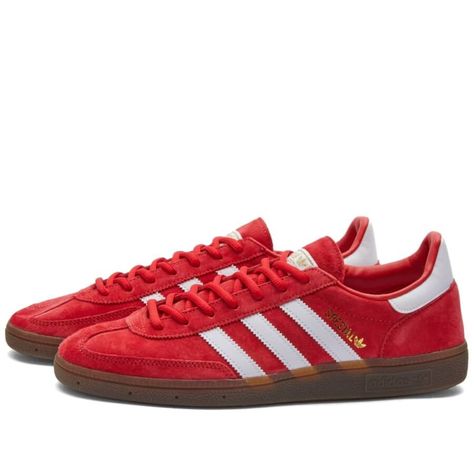 Originally introduced in 1978, the Adidas SPZL Handball has earned its place a true classic in terracewear and casual footwear. This scarlet red and white iteration is crafted from premium suede and showcases the iconic serrated three white stripes along the sidewalls. Underfoot, on-trend gum rubber soles provide comfort and durability. Where to buy? ( From £85 ) MR PORTER IN STOCK END. IN STOCK FOOTPATROL IN STOCK SNS IN STOCK OFFSPRING IN STOCK BSTN IN STOCK ASOS IN STOCK A... Red Adidas Shoes, Adidas Handball Spezial, Adidas Handball, Adidas Spezial, Shoe Inspo, Aesthetic Shoes, Red Sneakers, Swag Shoes, Red Adidas