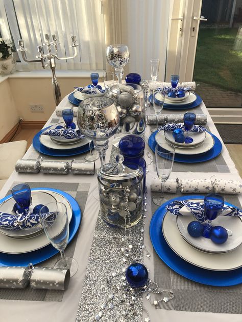 Blue And White Xmas Table Decor, Navy And White Tablescape, Blue And Silver Christmas Decorations Winter Wonderland, Blue Sliver White Christmas Decor Diy, Blue And White Xmas Decor, Christmas Table Blue And Silver, Blue Christmas Dining Table Decor, Blue Christmas Party Theme, Silver And Blue Christmas Table