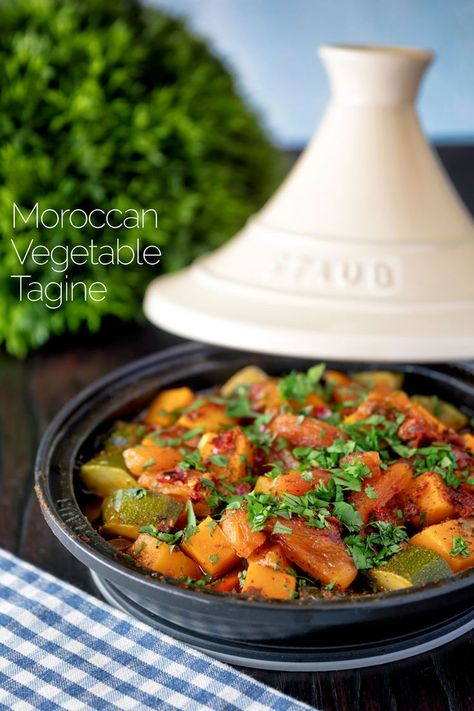 Moroccan influenced vegetable tagine, a dish that gets a hint of spice from harissa paste, a fab dish to use up leftover veg in the pantry. This easy tagine is both vegan and vegetarian, and whilst it takes around 50 minutes to make, only 10 minutes of that time is spent in the kitchen! Vegan Tagine, Vegetarian Tagine, Moroccan Tagine Recipes, Vegetable Tagine, Tagine Cooking, Moroccan Vegetables, Persian Recipes, Tagine Recipes, Harissa Paste