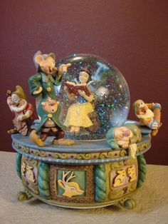 disney snow globes | Disney Snow Globe - Snow White - Rocking Chair Disney Music Box, White Rocking Chairs, Disney Snowglobes, Bell Jars, Musical Snow Globes, Disney Musical, Disney Figurines, Water Globes, Snow White And The Seven Dwarfs