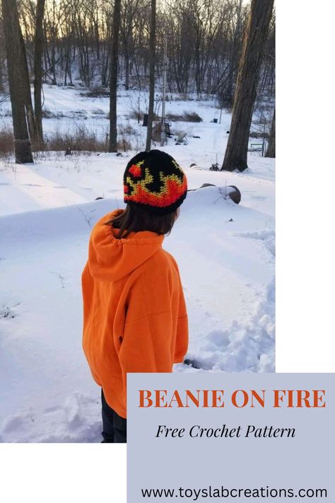 This crochet fire flame hat has an easy to follow crochet pattern containing detailed instructions on changing the colors. This crochet hat is great for the winter weather as you can see in the picture above. Find this free crochet beanie pattern on toyslabcreations.com #crochet #crochetpatterns #crochetbeanie #crochethat Crochet Fire Hat, Flame Crochet Pattern, Fire Beanie, Crochet Flame, Crochet Fire, Fire Crochet, Crochet Pattern Beanie, Flame Beanie, Baby Bonnet Pattern