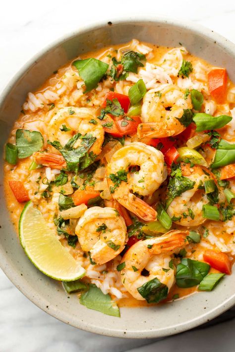 Busy weeknights are made for this Thai shrimp curry recipe! It's simple to make, and there's plenty of the rich coconut red curry sauce with fresh herbs to serve over rice. Easy Coconut Curry Sauce, Thai Seafood Curry, Red Curry With Shrimp, Shrimps With Rice, Shrimp Coconut Rice, Red Curry Shrimp Thai Coconut Milk, Thai Coconut Shrimp Curry, Shrimp Curry Recipe Thai, Shrimp And Fish Recipes