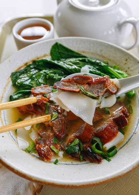 This Cantonese ho fun noodle soup with char siu is a tasty, simple recipe that makes a great lunch or quick weeknight dinner.  Source: thewoksoflife.com Cantonese Food Recipes, Cantonese Soup, Chinese Beef Noodle Soup, Woks Of Life Recipes, Chinese Noodle Soup, Meals In A Bowl, Traditional Asian Dish, Asian Noodle Soup, Nostalgic Recipes