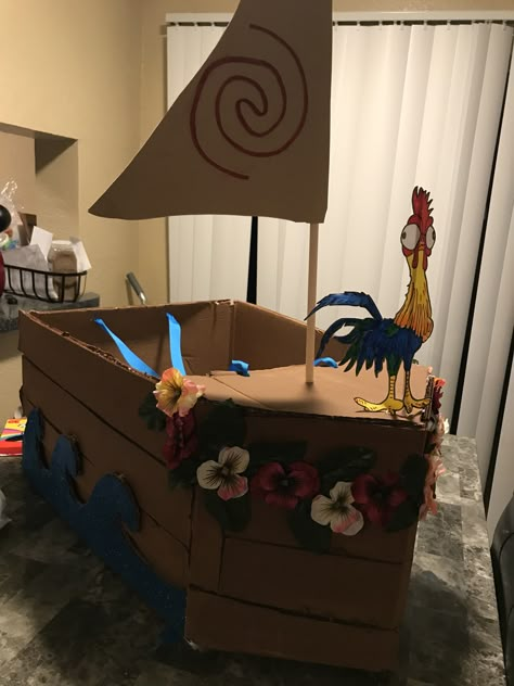 Cardboard box parade Cardboard Boat Ideas, Moana Parade Float Ideas, Cardboard Boat Diy, Moana Trunk Or Treat, Moana Float Parade, Cardboard Box Boat, Moana Homecoming Float, Diy Cardboard Boat Prop, Moana Boat Diy Cardboard