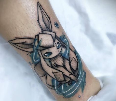 Glaceon tattoo by Cristian Carrion Eevee Tattoo Ideas, Eevee Tattoo Design, Glaceon Tattoo, Pokémon Tattoo Ideas, Eeveelutions Tattoo, Vulpix Tattoo, Gaming Tattoo Ideas, Pokemon Tattoo Ideas, Eevee Tattoo