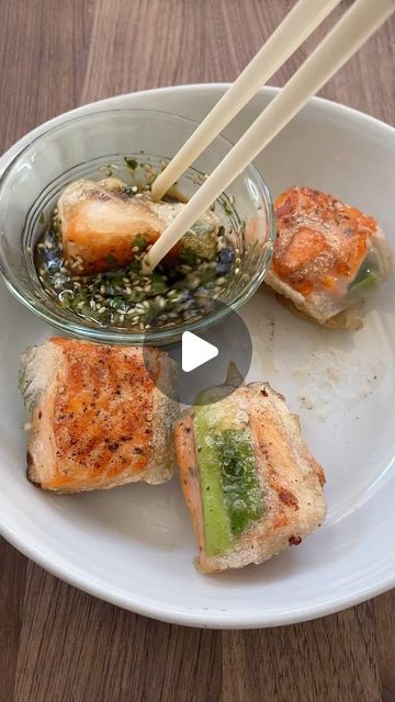 My Nguyen on Instagram: "Save and Share my recipe for Fire Cracker Salmon! It’s so easy to make! Simply fry some salmon, wrap in rice paper and green onions and fry again until crispy. The sauce is 1 tbsp soy sauce, 1 tbsp sesame oil, 1 tsp white vinegar, 1 tsp brown sugar and toss in some sesame seeds and cilantro. #firecrackersalmon #salmonrecipe #salmonroll #ricepaper #asianrecipes #asianfood #appetizerideas #healthyrecipes #easyrecipes #cookingvideos" Rice Paper Recipes Salmon, Fire Cracker Salmon, Firecracker Salmon, Rice Paper Recipes, Rice Paper Wraps, Salmon Wrap, Fire Cracker, Salmon Roll, Rice Wraps