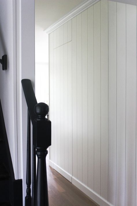 One of our favorite design elements to integrate is a hidden door. When I saw how the powder room was set up in a hallway I knew I would be able to this. I carried the 1x6 vertical boarding from the kitchen into the powder room hall and entry Since I have 8ft ceilings this helps add height to these spaces Shiplap Hallway, Benjamin Moore Simply White, Foyer Paint Colors, Hidden Closet, Fixer Upper Home, Before After Kitchen, Shiplap Backsplash, Room Visualizer, Apple Chips