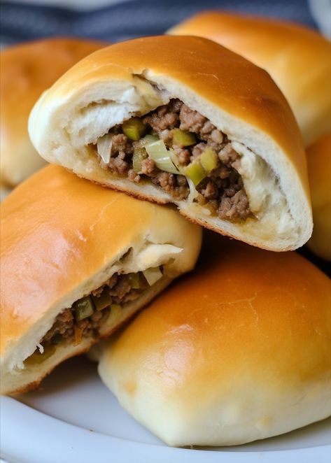 How to make Simple Nebraska Runzas Recipe Ingredients 16 Rhodes rolls (frozen unbaked roll dough) 1 lb lean ground beef 2 tablespoons butter 1 small yellow onion, finely chopped 2 cups finely chopped cabbage Salt and pepper to taste 1-2 tablespoons all-purpose flour 1 egg 1 tablespoon milk Instructions: Place frozen rolls on parchment-lined baking […] Bierocks Recipe Easy, God Bless America Cake, Runzas Recipe, Runza Casserole, Bierocks Recipe, Rhodes Rolls, America Cake, Frozen Rolls, Frozen Bread Dough