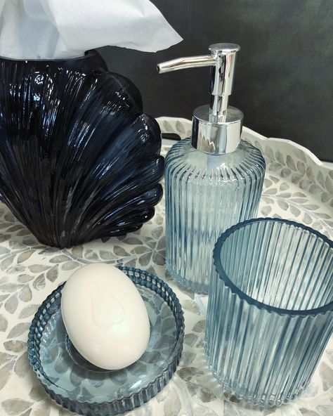 Our Shale Vase is the perfect tissue box for your costal themed bathroom 🐚 The gorgeous glass bathroom sets comes in blue (pictured), green, light grey and dark grey 🫧 Were open until 5 today, then 9-4 on Saturday ☺️ #shoplocal #melbourne #melbournedecorator #decor #beachvibes #styling #bathroomdecor #instadaily #supportsmallbusiness #homedecor #homestagingmelbourne #homestyling Bathroom Decor Light Blue, Blue Theme Bathroom, Sea Theme Bathroom, Were Open, Blue Bathroom Decor, Themed Bathroom, Aesthetic Bathroom, Blue Bath, Blue Pictures