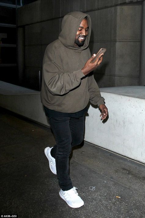 Meanwhile... West was seen arriving to LAX; he was laughing as he looked at his cell phone Smiling At Phone, Kanye West Smiling, Kim Kardashian Dress, Looking At Phone, Kanye West Songs, Men Street Look, Kanye West Outfits, Heavily Pregnant, Kardashian Dresses