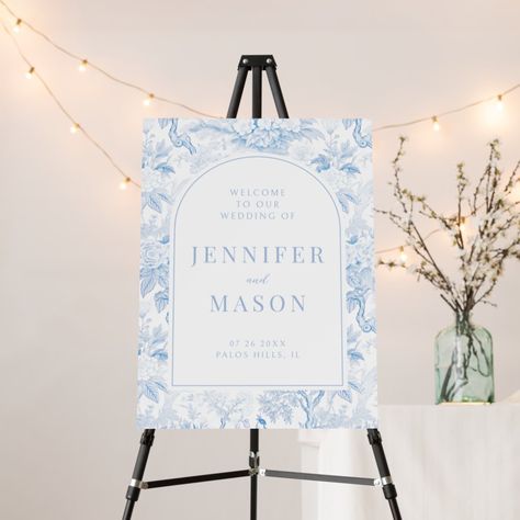 Welcome your guests in classic style with this charming bohemian light blue and white wedding welcome sign, mounted on durable foam board. Featuring an exquisite chinoiserie pattern inspired by blue porcelain, this sign adds a touch of delicate elegance to your wedding entrance, setting the tone for your celebration immersed in the beauty of nature. Chinoiserie Backdrop, Blue And White Chinoiserie Wedding Decor, Light Blue And White Wedding, Cinderella Wedding Welcome Sign, Blue And White Wedding Signage, White Wedding Welcome Sign, Blue Wedding Sign, Wedding Hydrangeas, Boho Wedding Welcome Sign