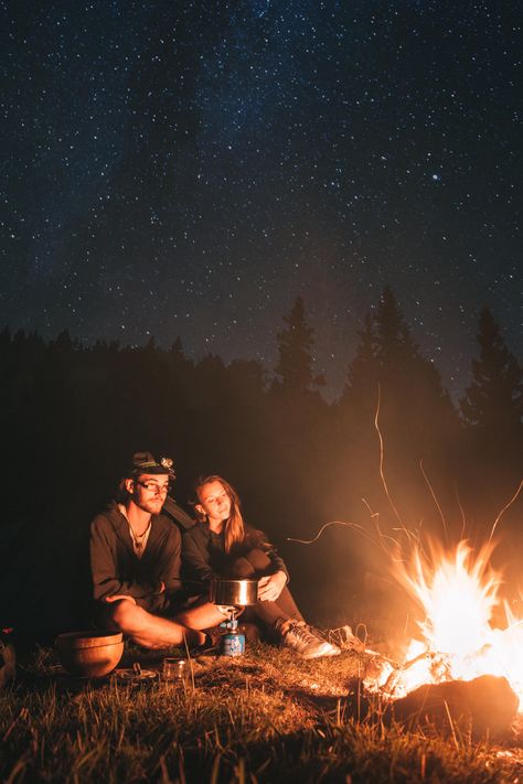 couple sitting near bonfire #man #woman #fire #pot #flame #night #evening #happy #couple #camping #outdoors #star long exposure #sky #travel #world #earth #mountain #bivouac #hike #5K #wallpaper #hdwallpaper #desktop Campfire Couple, Couples Camping, Wallpaper Maker, Couple Silhouette, Free High Resolution Photos, Sky Full Of Stars, Camp Fire, Black Wallpaper Iphone, Outdoor Tent