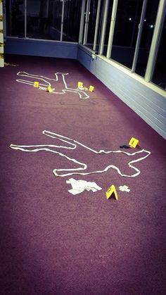 Crime scene decoration simply used masking tape and yellow paper. Police party law and order themed Police Party Theme, Doc Aesthetic, Fair Decorations, Rosie Project, Police Academy Graduation Party, Police Theme Party, Cop Party, Documentaries To Watch, Mafia Party