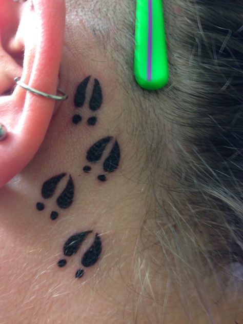 Hearing is the main sense you use when hunting so the deer tracks are behind my ear. Antler Behind Ear Tattoo, Deer Hoof Tattoo, Deer Track Tattoo For Women, Deer Tracks Tattoo, Deer Print Tattoo, Dog Hunting Tattoo, Ear Tag Tattoo, Small Hunting Tattoos, Hunting Tattoos For Women