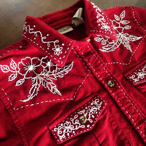 My first attempt at hand embroidery. Flowers and feathers western shirt. Western Shirt Embroidery, Diy Western Shirt, Cowboy Embroidery Designs, Western Embroidery Designs, Embroidered Western Shirt, Cowboy Embroidery, Embroidery Jeans Jacket, Flowers And Feathers, Western Embroidery