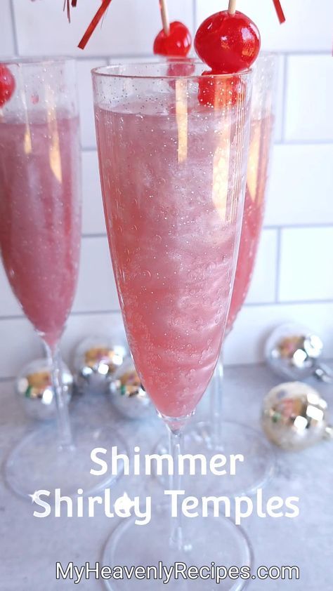 Shimmer Shirley Templates- girly New Years Eve drink recipe to make! Kid friendly or so pretty for adults. New years eve party non-alcoholic drink to make. Pink with cherries and silver shimmer glitters swirling around! Easy new years drink to make. Pink Party Drinks, New Years Eve Drink, New Years Drink, Shirley Temples, New Years Eve Drinks, Pink Drink Recipes, New Year's Drinks, Girly Drinks, Birthday Party Drinks