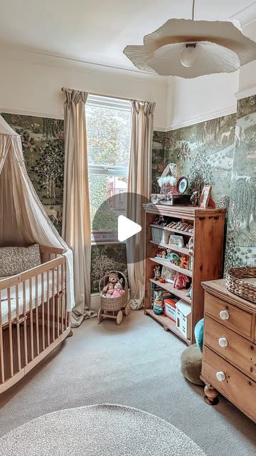 @the_greens_gaff on Instagram: "Nursery: A sanctuary where playtime never ends and imaginations run wild. A place to rest and dream. Somewhere safe and warm. A little slice of childhood nestled into our home where all of the stories come alive and we are free 🫶🏻 

Wallpaper: @wmorrisandco 
Paint: @crownpaintsuk 
Crib: @tweeto.uk 
Canopy: @mabelandfox 
Cushions: @wmorrisandco 
Curtains: @jysk.uk 
Play mat: @totterandtumble 
Mirror: @williamwood 
Pregnancy sculpture: @bump_sculpture 
Wash basket: @shopmatalan 
Mushroom door hooks: @urbanoutfitters
Wardrobe, drawers and bookshelf: @facebookmarketplace" Wash Basket, Wardrobe Drawers, Door Hooks, Play Mat, Free Wallpaper, Our Home, Cribs, Bookshelves, Drawers