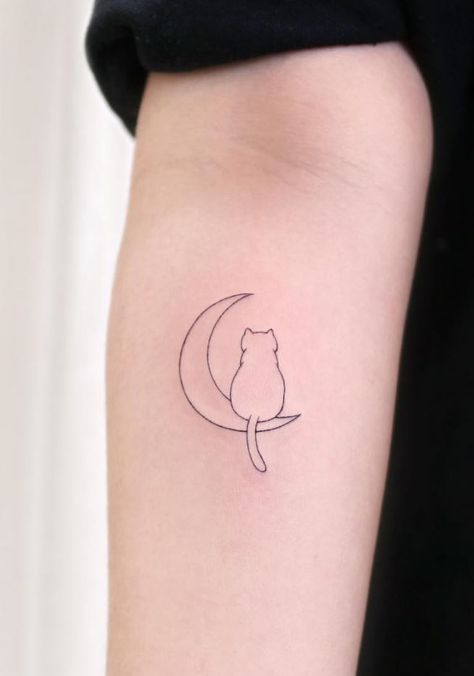 Little Cat On The Moon Tattoo - TattManiaTattMania Cat On Crescent Moon Tattoo, Cat In A Moon Tattoo, Cat And Moon Tattoo Simple, Cat In Moon Tattoo, Cat On The Moon Tattoo, Moon With Cat Tattoo, Cat Tattoo Moon, Sitting On Moon Tattoo, Minimalist Tattoo Cat