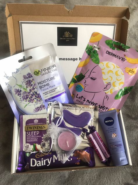 Treat yourself or someone special to one of our pamper gift boxes. Perfect for any occasion whether that be for a birthday, distance care package, mothers day, pick me up or even just because... This is an A5 sized box.  Content: - Garnier Face Mask - Hair Sheet Mask - Nivea Hand Cream  - Under Eye Gel Mask - X2 Parma Violets - Twinnings Tea bag - candle - Chocolate  * Product types may change due to stock availability however will be equally as good.  If you would like to send a message to the Twinnings Tea, Chocolate Product, Birthday Hug, Parma Violets, Mask Hair, Personalised Gifts Diy, Diy Gift Set, Gift Boxes For Women, Gifts For Girlfriend