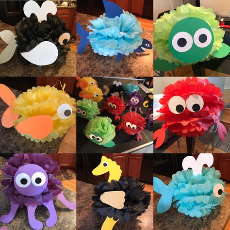 Dollar Store DIY: Under the Sea Tissue Pom Pom Creatures — Legally Crafty Blog Under The Sea Crafts, Ocean Classroom, Under The Sea Decorations, Ocean Theme Classroom, Mermaid Theme Birthday Party, Preschool Classroom Decor, Vbs 2024, Sea Baby Shower, Mermaid Theme Birthday