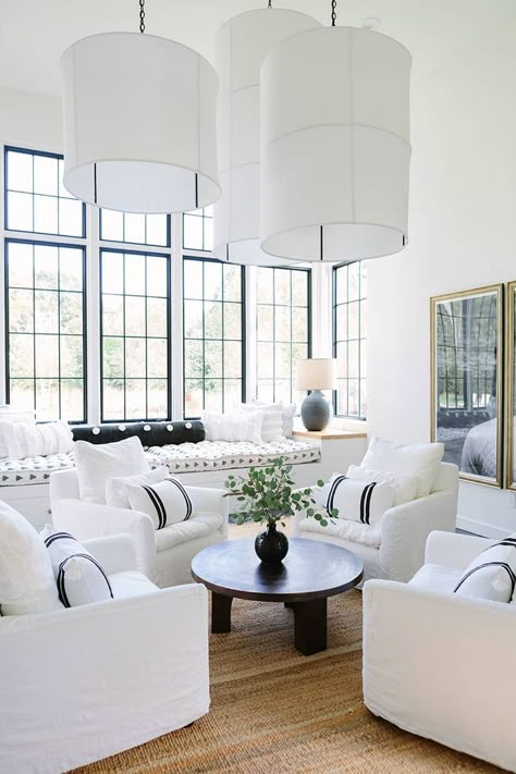 This modern family home in Nashville is drenched in sunlight and makes a strong case for all-white décor. Take a tour. Formal Living Room Decor, Formal Living Room Designs, Best Wall Colors, Furnitur Ruang Keluarga, Home Bunch, White Living Room, White Rooms, Family Room Design, White Furniture