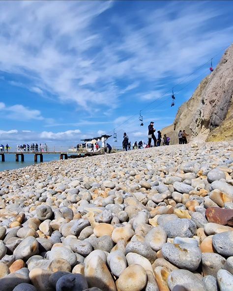 Beautiful Pebble Beach at The Needles, Isle of Wight, England. See Chairlift, Seashore, Waves, and Boat cruises 🏖️🌊🚤 #travel #nature #vacation #beach #england Needles Isle Of Wight, Isle Of Wight, Pebble Beach, England, Travel, Instagram